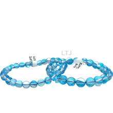 Cargar imagen en el visor de la galería, Radiant Blue and White Aura Quartz Bracelet