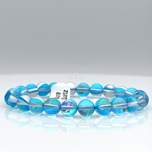 Cargar imagen en el visor de la galería, Radiant Blue and White Aura Quartz Bracelet