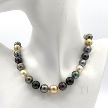 Load image into Gallery viewer, Akoya pearl necklace hanging on the doll