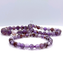 Load image into Gallery viewer, Super Seven Gemstone bracelet
