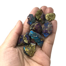 Load image into Gallery viewer, Charco-pyrite rough stones on a hand