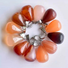 Load image into Gallery viewer, A bunch of Carnelian Pear shaped pendants