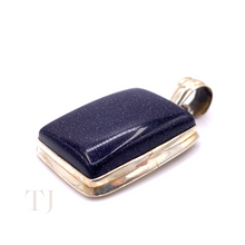 Load image into Gallery viewer, closer view of Blue Gold Sandstone cabochon in sterling silver setting pendant with a bail
