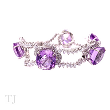 Cargar imagen en el visor de la galería, Amethyst princess cut stones are placed in a sterling silver framed bracelet