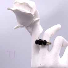 Load image into Gallery viewer, Three Black Onyx Cabochon stones in sterling silver setting ring on a doll's hand