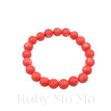 Load image into Gallery viewer, Top view of Australian Salmon Coral Bead Bracelet