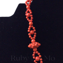 Cargar imagen en el visor de la galería, left view of Australian Coral Bead Necklace with flower shaped pendant