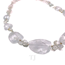 Load image into Gallery viewer, left side view of Aquamarine faceted graduated style necklace with 14k gold clasp