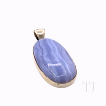 Load image into Gallery viewer, Blue Lace Agate Oval Cabochon in sterling silver framed pendant