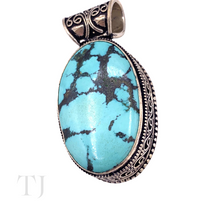Load image into Gallery viewer, Blue Turquoise Oval Cabochon in sterling silver pendant