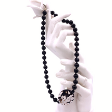 Load image into Gallery viewer, Black Onyx Necklace with Agate Pendant In sterling silver on a doll's hand