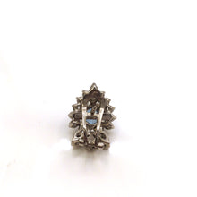 Load image into Gallery viewer, back view of Blue Topaz Oval cut stones in sterling silver setting earrings with diamonique