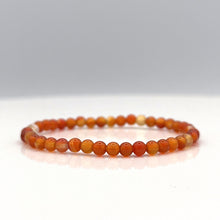 Load image into Gallery viewer, Carnelian Bead bracelet with elastic string