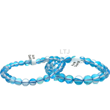 Cargar imagen en el visor de la galería, Radiant Blue and White Aura Quartz Bracelet
