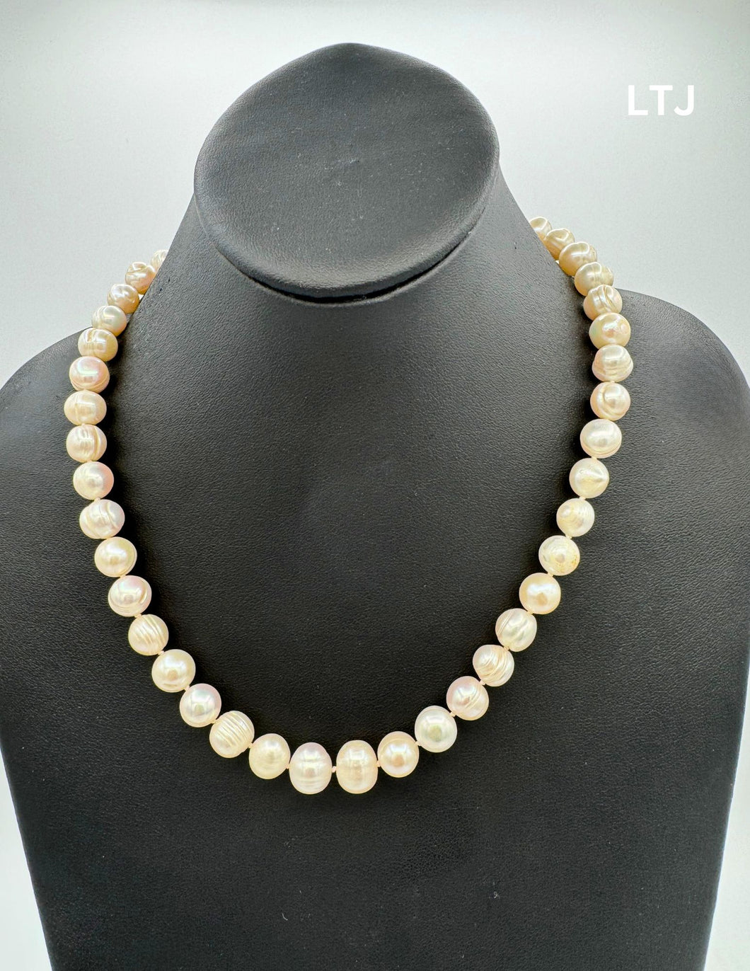 Fresh water pearl necklace with round sterling silver clasp 18