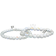 Load image into Gallery viewer, Radiant Blue and White Aura Quartz Bracelet
