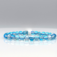 Cargar imagen en el visor de la galería, Radiant Blue and White Aura Quartz Bracelet
