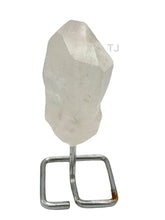 将图片加载到图库查看器，Quartz point crystal on stand
