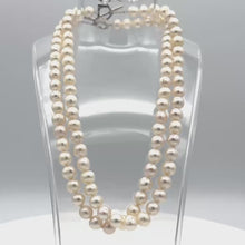 Load and play video in Gallery viewer, White pearl knotted necklace with metal heart lock (8 mm 18&quot;)
