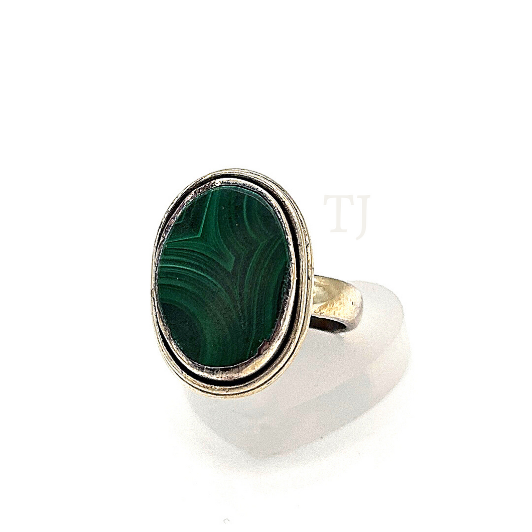 Oval shaped malachite ring in sterling silver