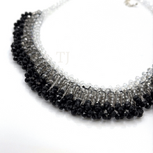 Load image into Gallery viewer, side view of Black and white Swarovski Necklace with sterling silver clasp
