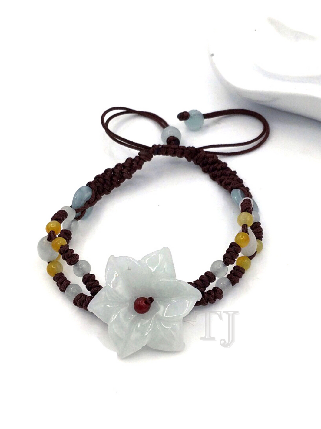 Jade flower carving in double string adjustable bracelet