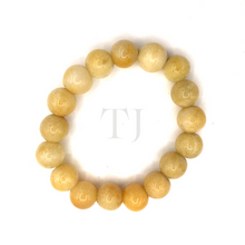 Cargar imagen en el visor de la galería, Light yellow colored Jade Bracelets (12mm)
