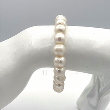 将图片加载到图库查看器，Freshwater white pearl stretchy bracelet 
