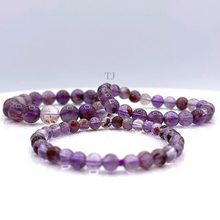 Load image into Gallery viewer, Super Seven Gemstone bracelet
