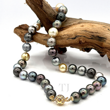 Load image into Gallery viewer, closer view of Akoya pearl necklace with 14k gold clasp
