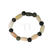 Load image into Gallery viewer, Top view of Jade bracelet with elastic string
