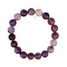 Load image into Gallery viewer, Super Seven Gemstone bracelet
