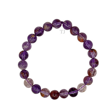 Load image into Gallery viewer, Super Seven Gemstone bracelet
