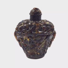 Load and play video in Gallery viewer, Misty Forest: A Hand-Carved Amber Snuff Bottle
