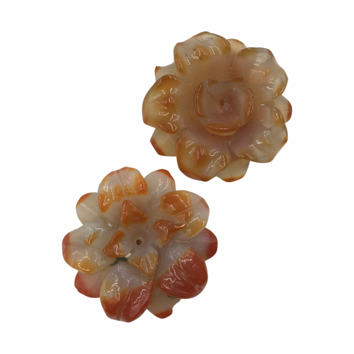 Two Carnelian flower shaped pendants