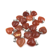 Load image into Gallery viewer, A bunch of Carnelian Heart shaped pendants
