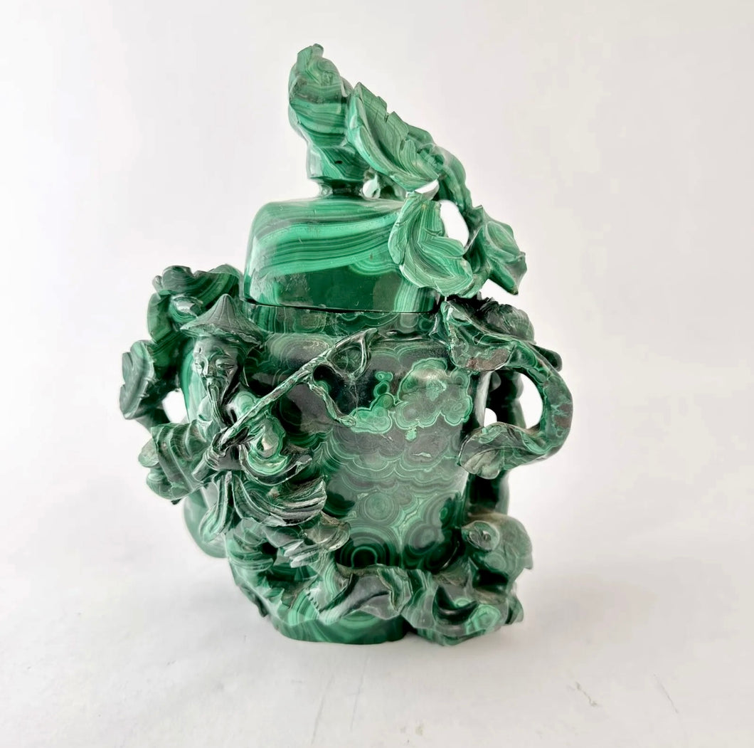 Nature's Serenity: A Malachite Vessel of an Old Man