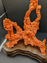 Load image into Gallery viewer, Divine Serenade: Carved Coral Goddesses and the Melodies of Nature
