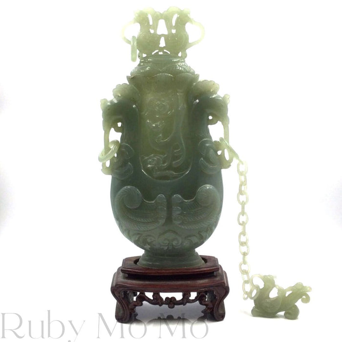 Antique Jade Incense Burner with a chain and a figurine