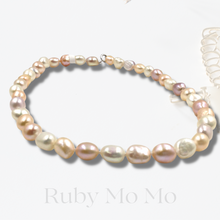 Cargar imagen en el visor de la galería, Multi-color Freshwater Oval Baroque Pearl Necklace in Sterling Silver
