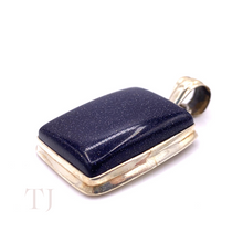 Load image into Gallery viewer, closer view of Blue Gold Sandstone cabochon in sterling silver setting pendant with a bail
