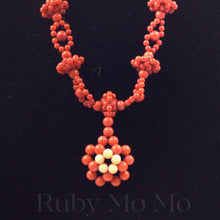 Load image into Gallery viewer, closer view of Australian Coral Bead Necklace with flower shaped pendant
