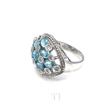 Load image into Gallery viewer, side view of Aquamarine stones in sterling silver setting ring with diamonique
