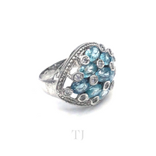 Load image into Gallery viewer, side view of Aquamarine stones in sterling silver setting ring with diamonique
