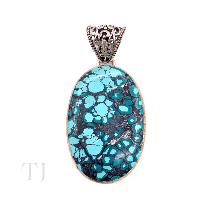 Blue Turquoise Oval Cabochon in sterling silver pendant