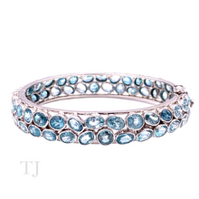 Load image into Gallery viewer, Aquamarine oval cut stones in sterling silver bangle bracelet setting
