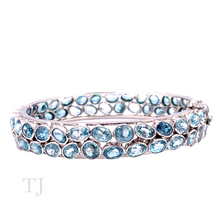 Load image into Gallery viewer, Aquamarine oval cut stones in sterling silver bangle bracelet setting
