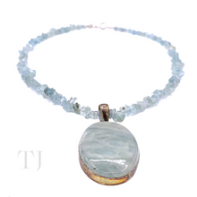 Load image into Gallery viewer, closer view of Aquamarine chip necklace with oval shaped aquamarine pendant in silver
