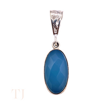 Load image into Gallery viewer, Blue Calcedony faceted oval shape in a sterling silver setting pendant with a bail
