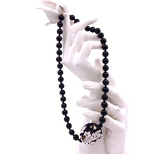 Load image into Gallery viewer, Black Onyx Necklace with Agate Pendant In sterling silver on a doll&#39;s hand
